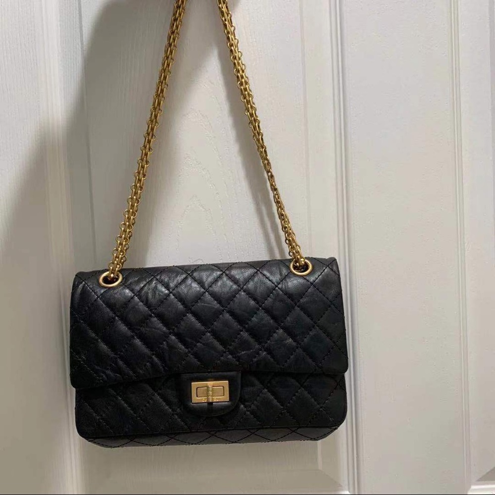Chanel reissue black and gold